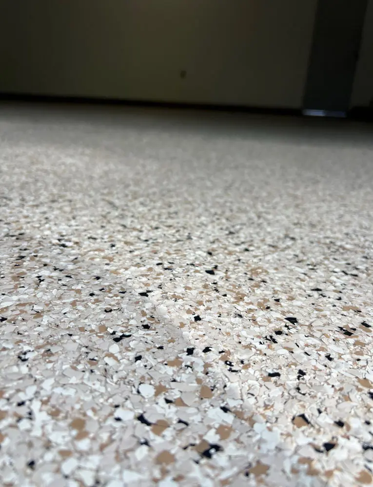 Commercial floor coating installation by Yukon Concrete Coatings